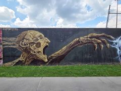 Wombat Fire<br/>2026 - <br/><span style= "font-size: 6pt">33.75250591407515, -84.3623413801802</span> Street Art Mural in Cabbagetown Atlanta by Wombat Fire featuring a magical creature