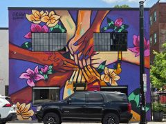 Drew Borders<br/>2026 - <br/><span style= "font-size: 6pt">33.75426799268887, -84.37483264282787</span> Street Art Mural in Sweet Auburn Atlanta by Drew Borders featuring several hands