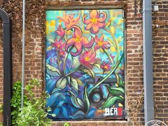 Michael Berzsenyi<br/>2026 - <br/><span style= "font-size: 6pt">33.75042802181059, -84.40017558339414</span> Street Art Mural in Castleberry Hill Atlanta by Michael Berzsenyi featuring flowers