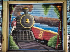 Aires Viera and Fungusfern<br/>2026 - <br/><span style= "font-size: 6pt">33.750507696303245, -84.40009320241302</span> Street Art Mural in Castleberry Hill Atlanta by Aires Viera and Fungusfern featuring a train