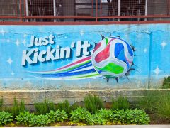 Jessi Queen<br/>2026 - <br/><span style= "font-size: 6pt">33.802693410301856, -84.4289981018879</span> Street Art Mural in Upper West Side Atlanta by Jessi Queen featuring a soccer ball