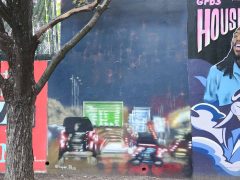 Street Art Mural in Cabbagetown Atlanta by Austin Blue featuring a street scene