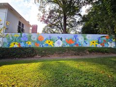 Street Art Mural in Morningside Atlanta by Margo Perkins featuring flowers
