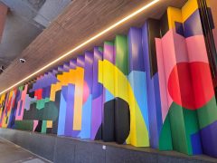 Lenticular Street Art Mural in Downtown Atlanta by Hense (Alex Brewer) featuring a colorful abstract pattern