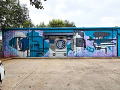 Street Art Mural in Edgewood Atlanta by an unknown artist featuring dry cleaning equipment.