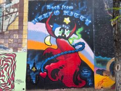 Street Art Mural in Cabbagetown Atlanta by Will Mitchell featuring Hello Kitty