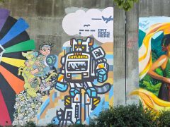 Street Art Mural in Cabbagetown Atlanta by Catlanta (Rory Hawkins) featuring a robot cat