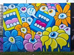 Street Art Mural in Cabbagetown Atlanta by Greg Mike featuring Larry Loudmouf