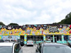 Street Art Mural in Little Five Points Atlanta by Kyle Brooks featuring several whimsical characters