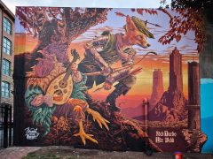 Street Art mural in Cabbagetown Atlanta by Nick Turbo Benson and Liz Webb featuring Robin Hood
